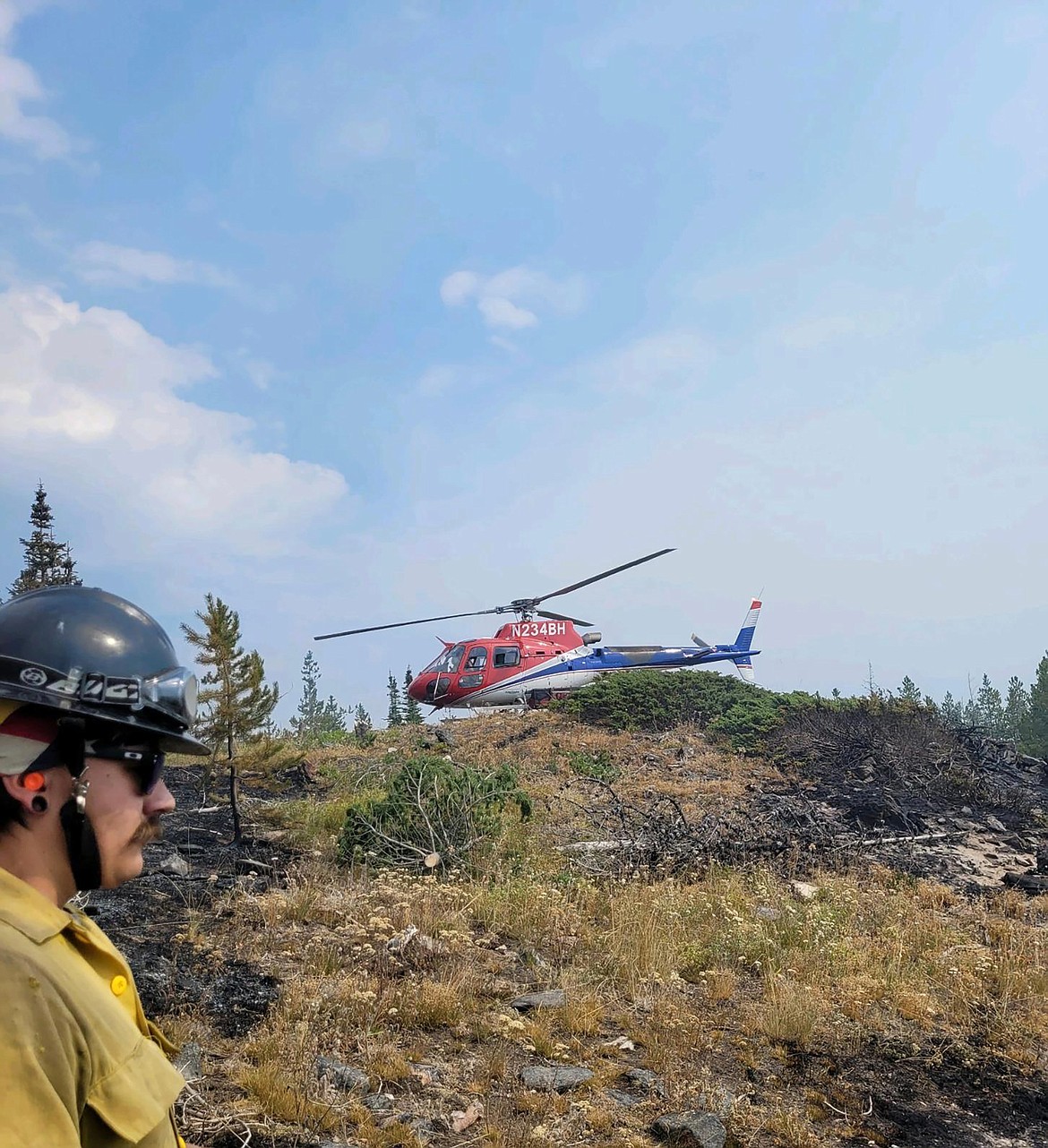 Firefighters are dropped off on Eneas Peak on Aug. 20. The fire is now part of the Kootenai River Complex, which has burned just under 11,000 acres.