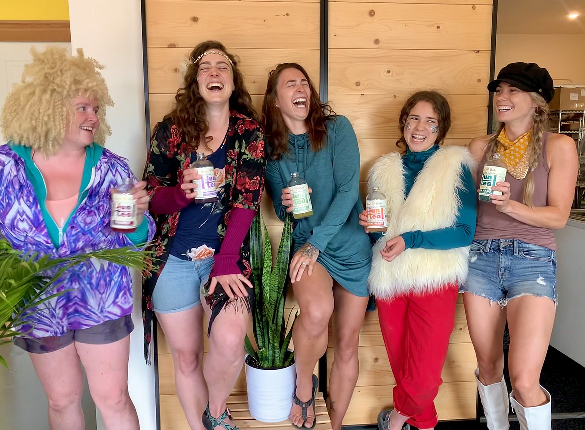 The team at Vibrant Roots shares a hearty laugh. From left to right: Macy Miller, Maggi Crotty, Jasmine Bloemeke, Signe Ebbetts and Brooke Lynn Dodson.