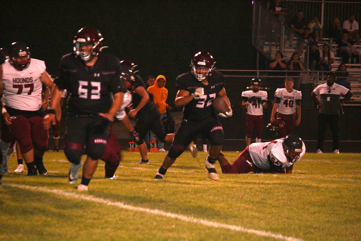 Wahluke running back Anthony Zebrano, 32, looks for an opening during the Wahluke-Grandview game Friday.