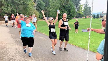 More than 100 walkers and runners came out for the Dwight Bershaw Memorial Point .5K at McEuen Park on Saturday. The fundraiser is put on by the Sunrise Rotary Club of Coeur d'Alene. It included doughnuts about halfway through the 547-yard course, cheers at the finish line, shirts and refreshments.