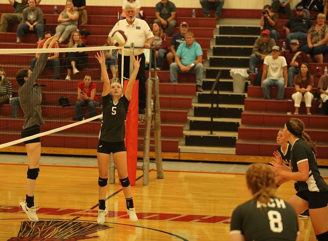 Junior Kayleigh Elder finishes setting the ball during Tuesday's match. Pick up a copy of the Columbia Basin Herald on Thursday for game coverage.