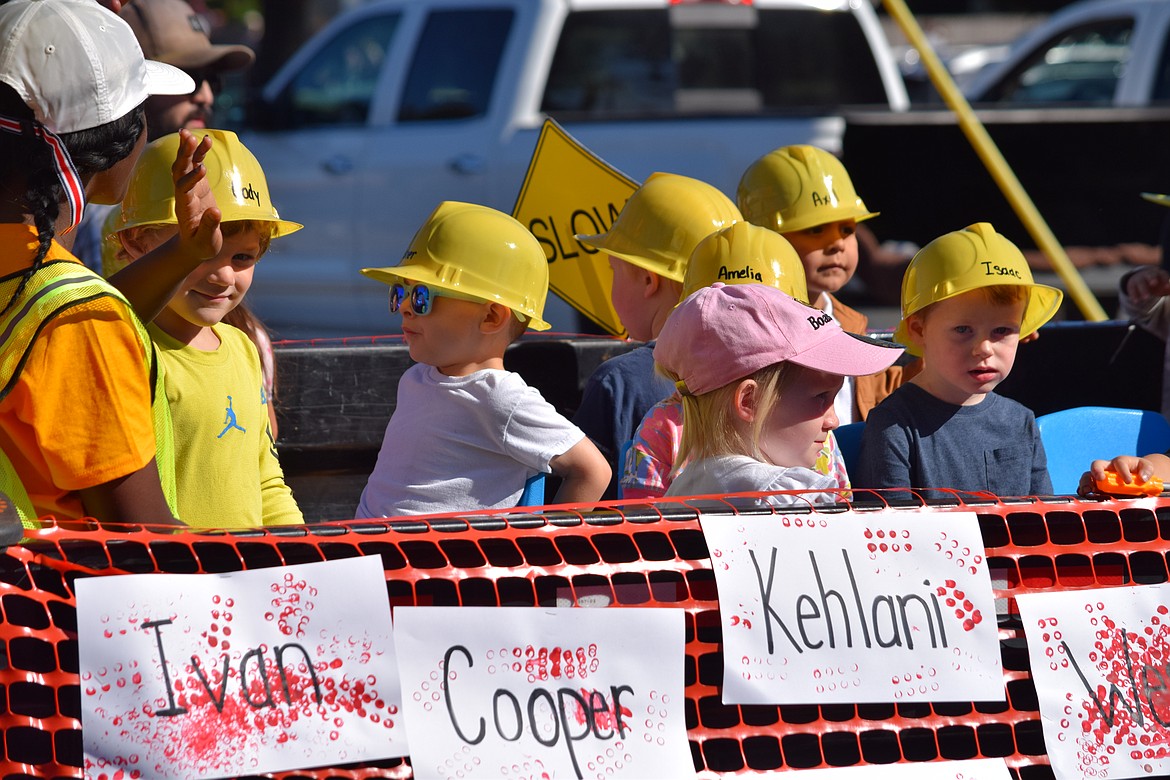 Entrants donned their hard hats for the 2021 Farmer Consumer Awareness Day parade. The 2022 Quincy town celebration is scheduled for Saturday. The annual celebration works to raise consumer awareness of the importance of farming.