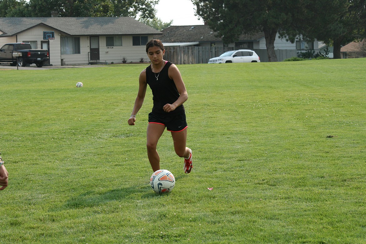 Bella Neveah Garza, Othello High School soccer, during practice drills Friday.