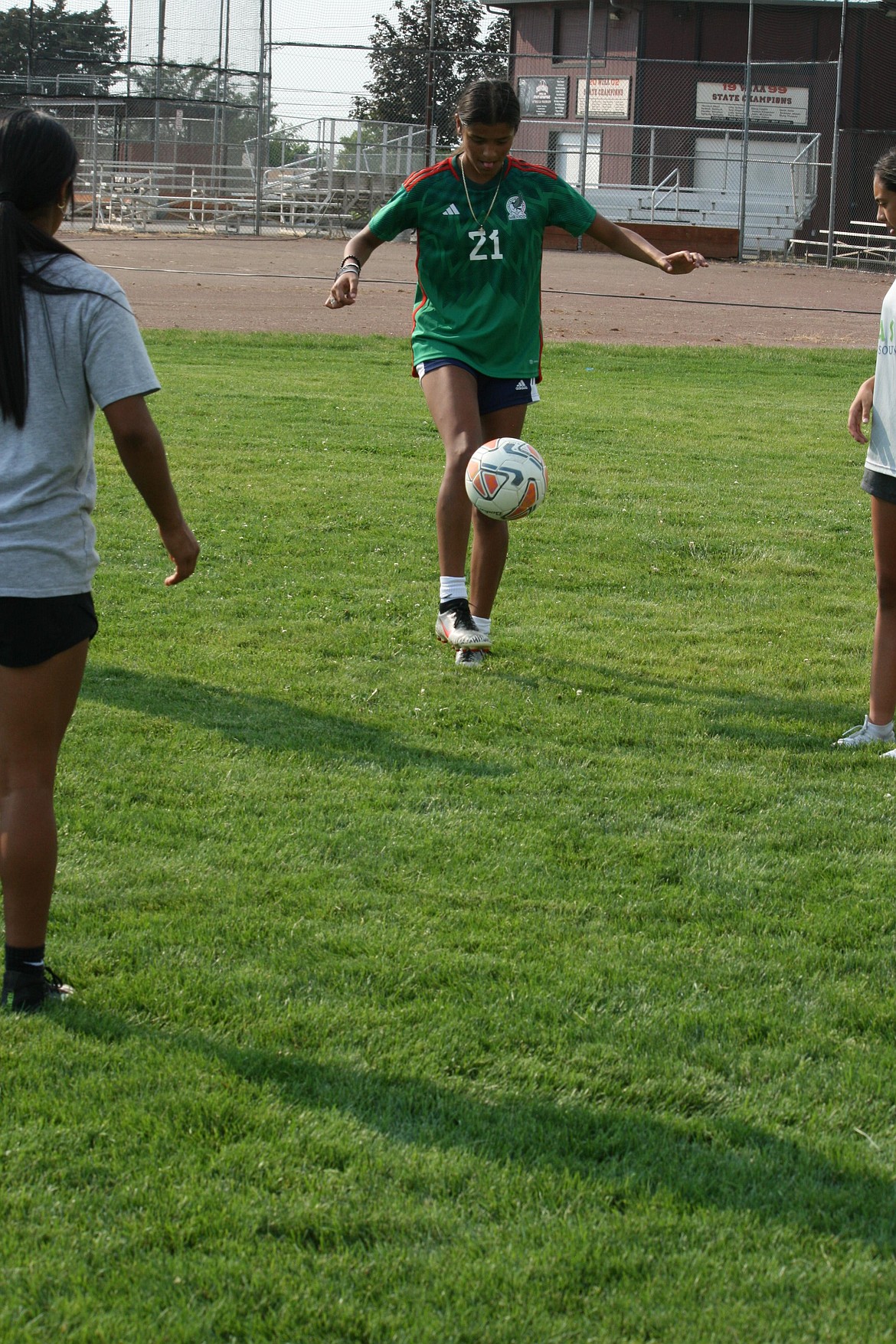 Rubi Mondragon works the ball during a drill at Friday’s Othello High School girls soccer practice.