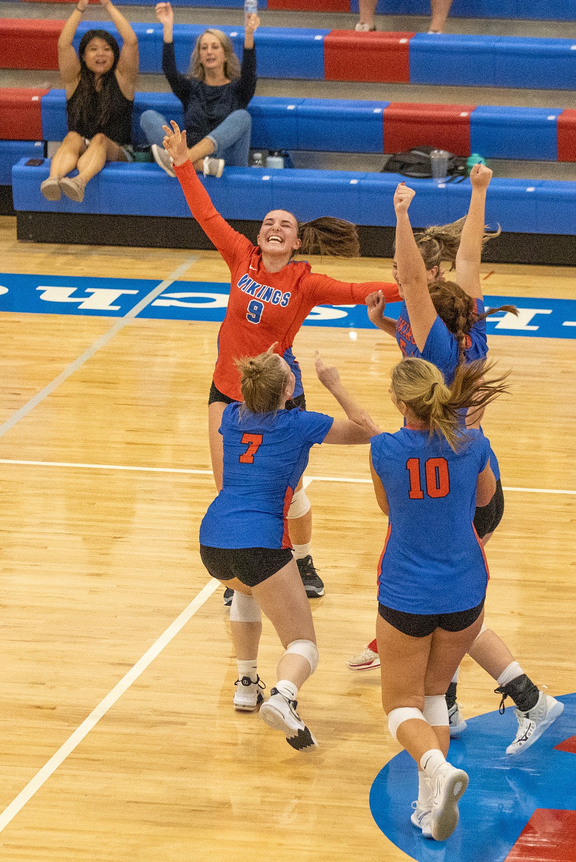 Photo by JERRY VICK
Coeur d'Alene players celebrate after beating Post Falls on Tuesday night at Coeur d'Alene High.