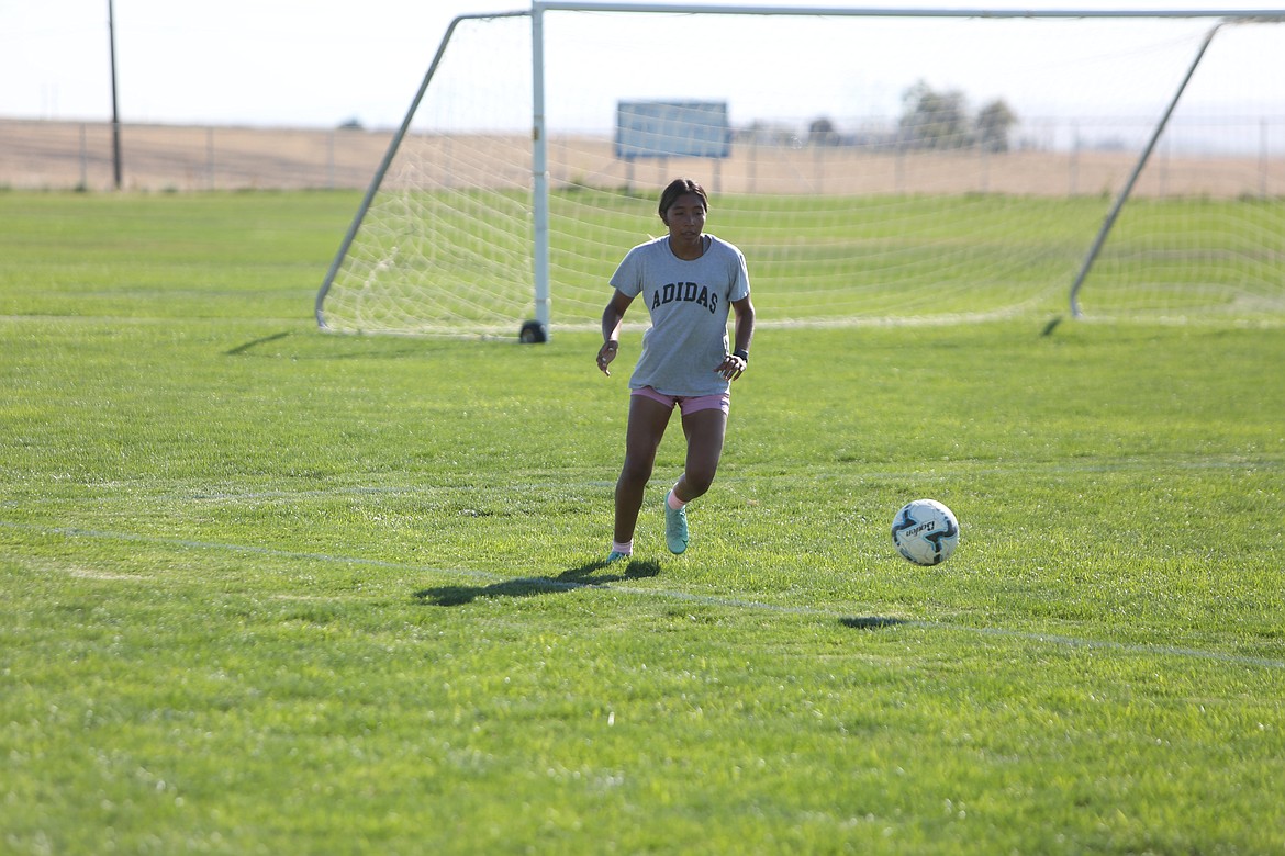 Drills in practice included passing from one player to another and attempting to touch the ball only once.