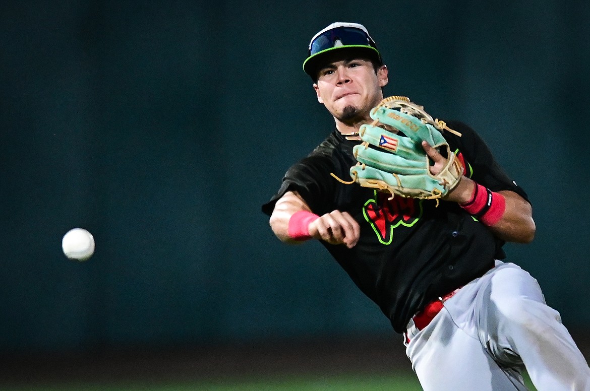 Great Falls shortstop Cristopher De Guzman fires across the diamond for an out after charging a ground ball against Glacier at Flathead Field on Wednesday, Sept. 7. (Casey Kreider/Daily Inter Lake)