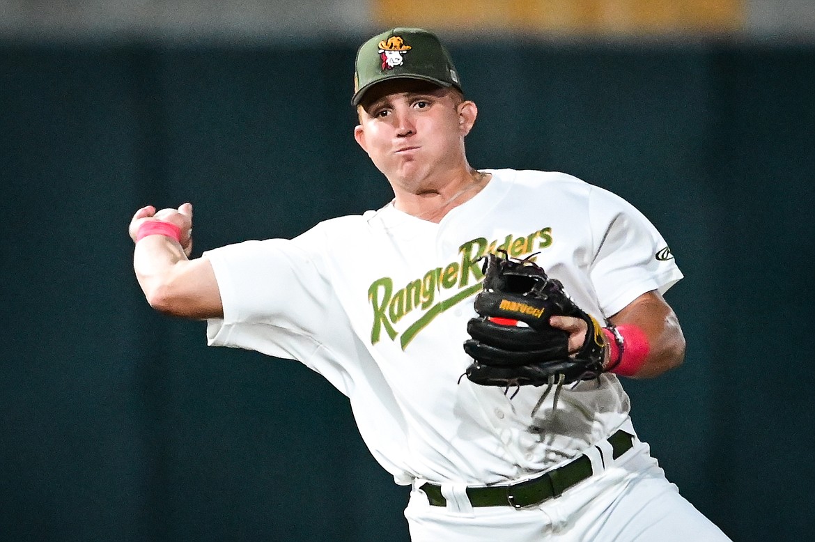 Glacer third baseman Dean Miller (30) fires over to first base for an out against the Great Falls Voyagers at Flathead Field on Wednesday, Sept. 7. (Casey Kreider/Daily Inter Lake)