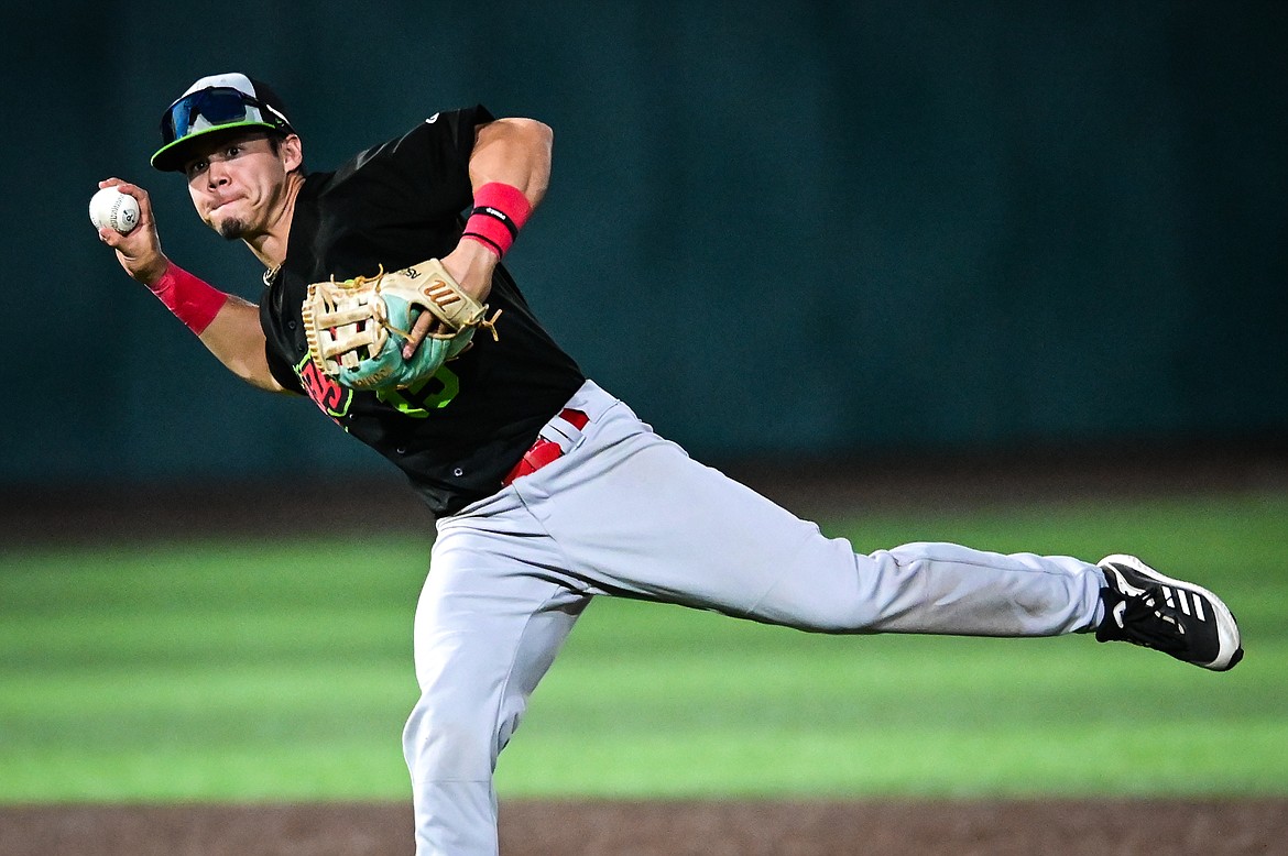 Great Falls shortstop Cristopher De Guzman fires across the diamond for an out after charging a ground ball against Glacier at Flathead Field on Wednesday, Sept. 7. (Casey Kreider/Daily Inter Lake)