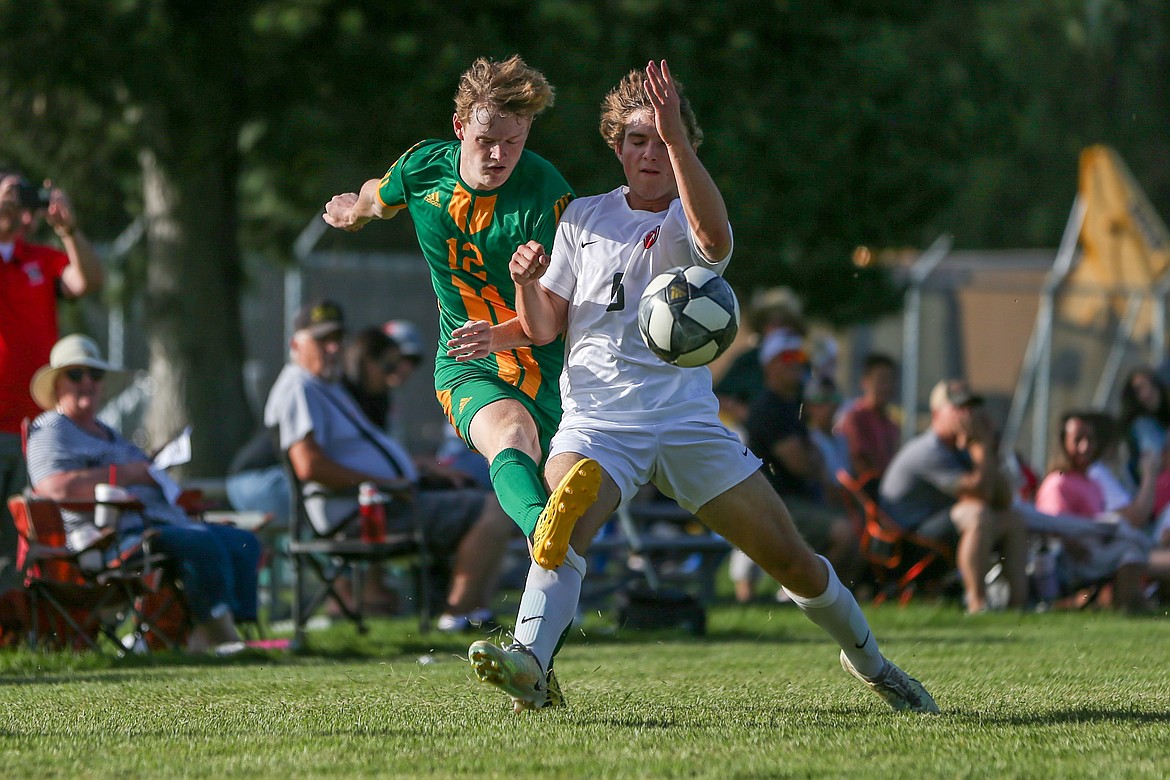 JASON DUCHOW PHOTOGRAPHY
Sandpoint's Pierce McDermott plays the ball away from the defense of Lakeland's Owen Rose during Wednesday's match at Sunrise Rotary Field in Rathdrum.
