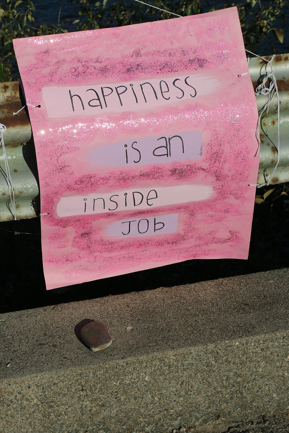 One of the signs placed along the Long Bridge walking bridge during Sunday's Walk for HOPE.