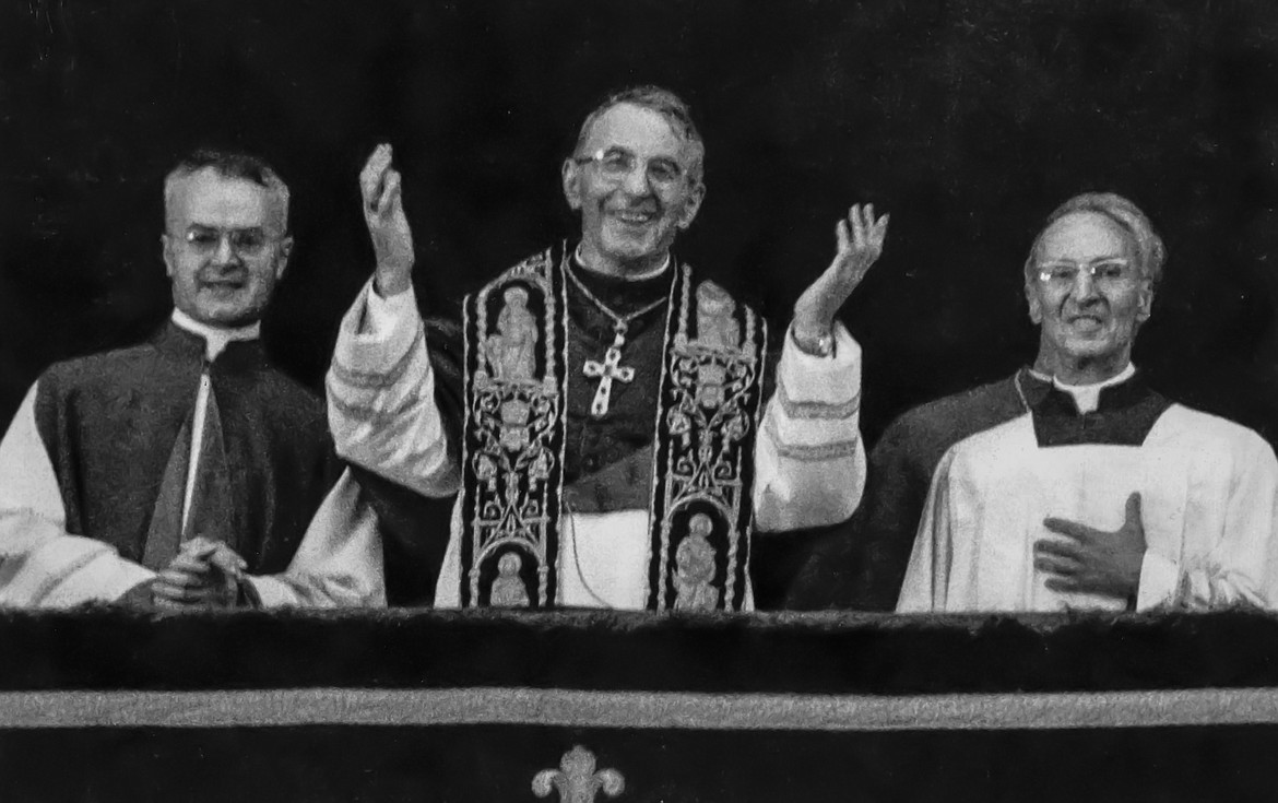 Pope John Paul I, flanked by Masters of the pontifical ceremonies, Monsignor Virgilio Noé, right, and Monsignor Orazio Cocchetti, left, smiles as he appears at the lodge window of St. Peter's Basilica soon after his election Saturday, Aug. 26, 1978. On Sunday, Sept. 4, 2022, Pope Francis beatified John Paul I, the last formal step before on the path to possible sainthood.