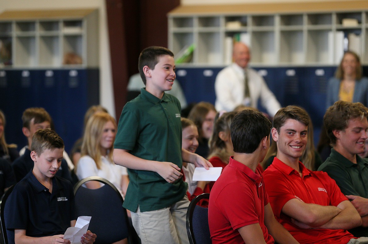 Eighth grader Mason Stevenson asks Gov. Brad Little a question about funding for the new Empowering Parents program Thursday morning at Coeur d'Alene Charter Academy.