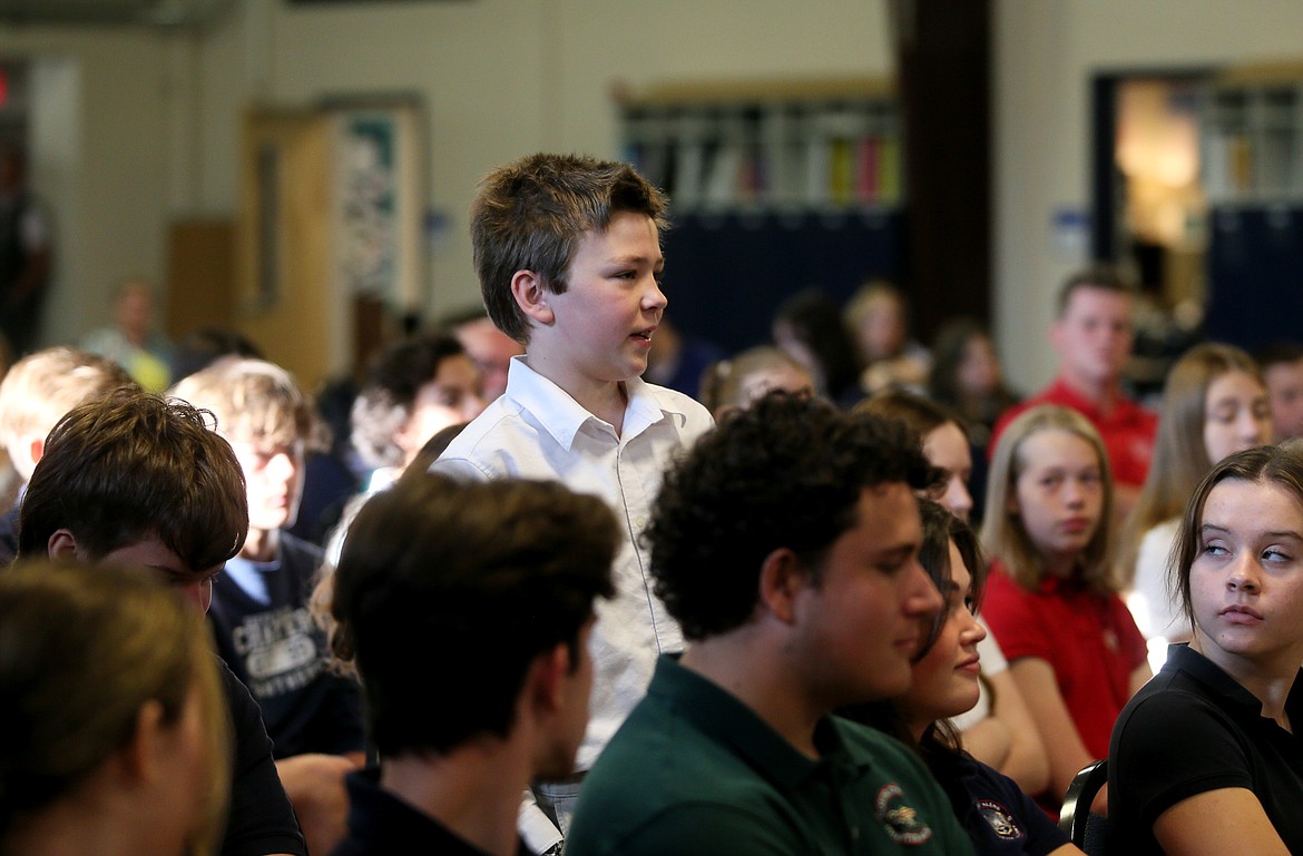 Coeur d'Alene Charter Academy eighth grader Damien Hober poses a question to Gov. Brad Little on Thursday morning.