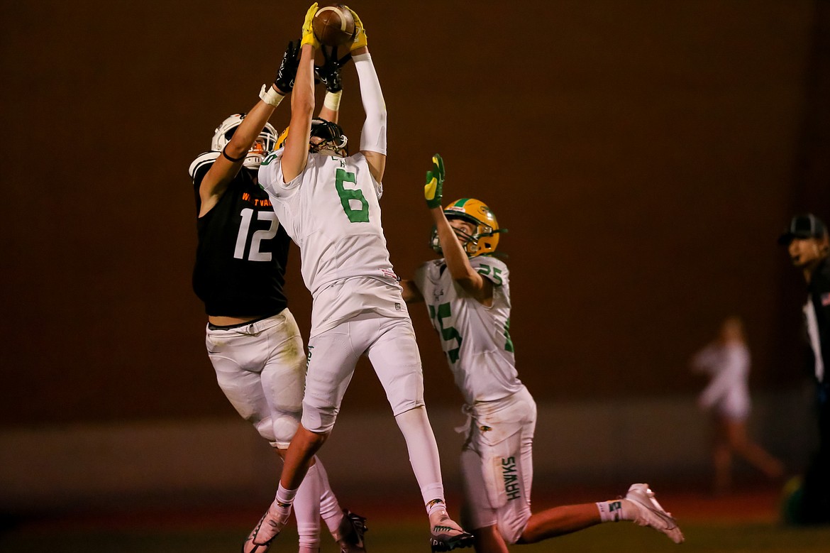 JASON DUCHOW PHOTOGRAPHY
Roan Reilly (6) of Lakeland leaps for an interception in the fourth quarter at West Valley on Thursday night.