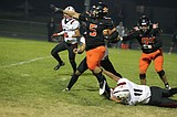 PREP FOOTBALL: Bust-out night for Trojans