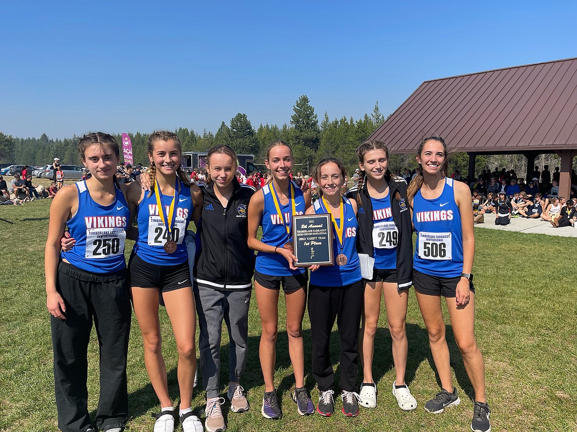 Courtesy photo
The Coeur d'Alene girls claimed the team title at the Timberlake Invitational on Saturday at Farragut State Park. From left are Zara Munyer, Elliana Rietze, Olivia Fisback, Anne Marie Dance, Olivia May, Chloe Frank and Kira Wood.