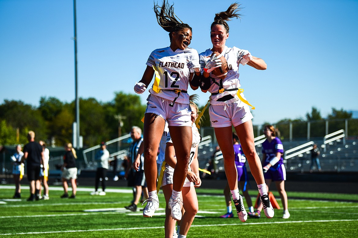 Flathead's Akilah Kubi (12) and Peyton Walker (1) celebrate after a touchdown run by Walker against Butte at Legends Stadium on Saturday, Sept. 10. (Casey Kreider/Daily Inter Lake)