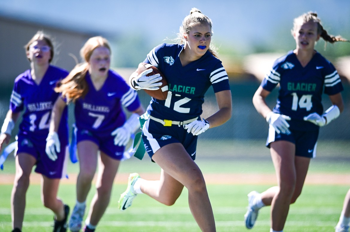 Glacier's Aubrey Price (12) picks up yardage after a reception against Butte at Legends Stadium on Saturday, Sept. 10. (Casey Kreider/Daily Inter Lake)