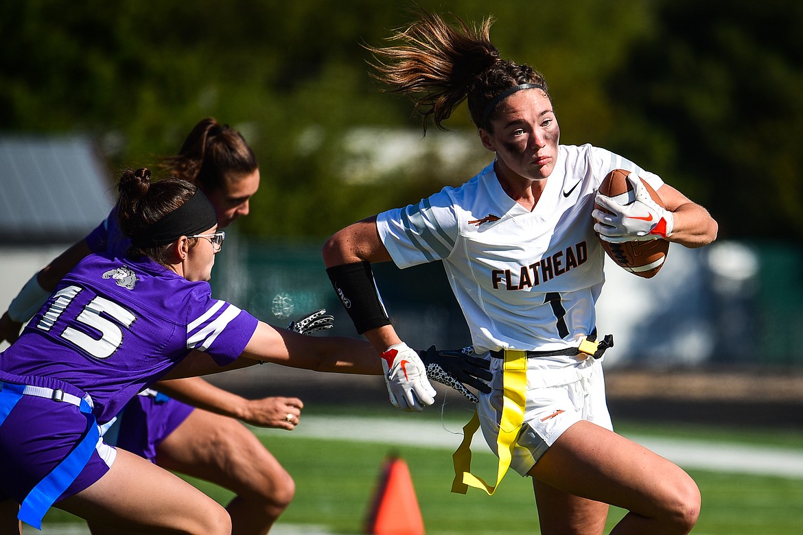 Flathead's Peyton Walker (1) gets around Butte defenders for a touchdown at Legends Stadium on Saturday, Sept. 10. (Casey Kreider/Daily Inter Lake)