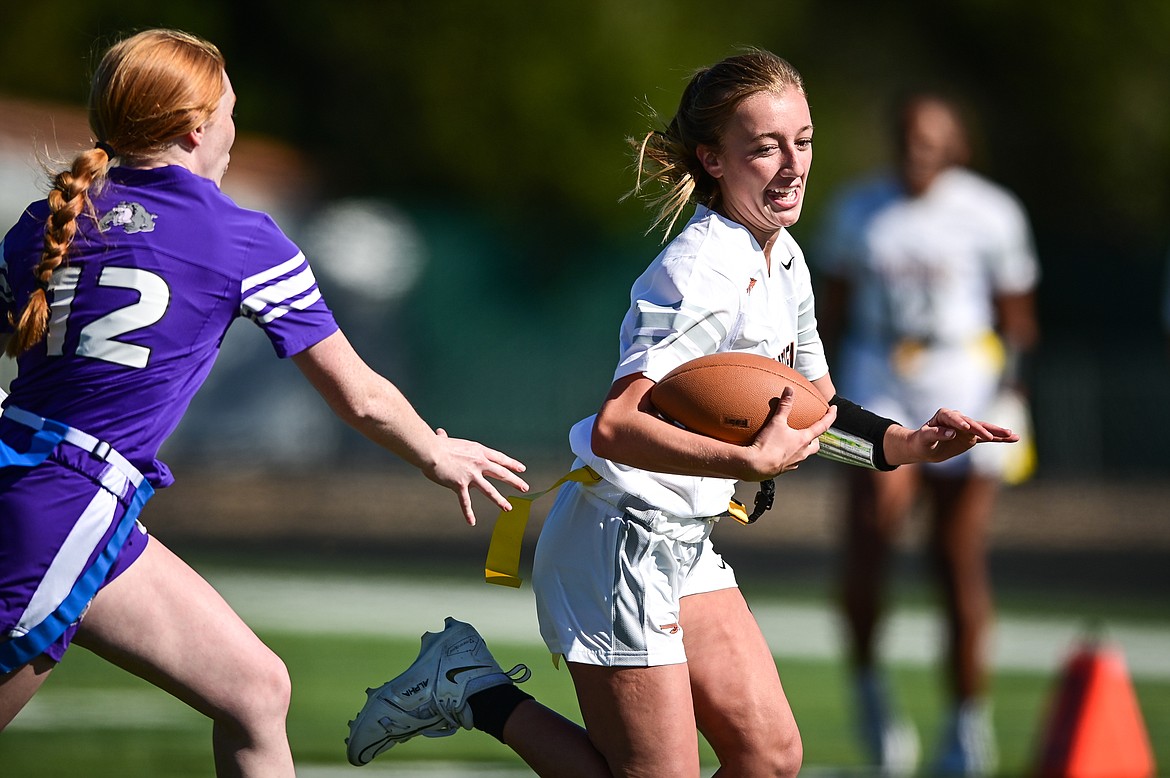 Flathead's Harlie Roth (6) returns an interception on defense against Butte at Legends Stadium on Saturday, Sept. 10. (Casey Kreider/Daily Inter Lake)