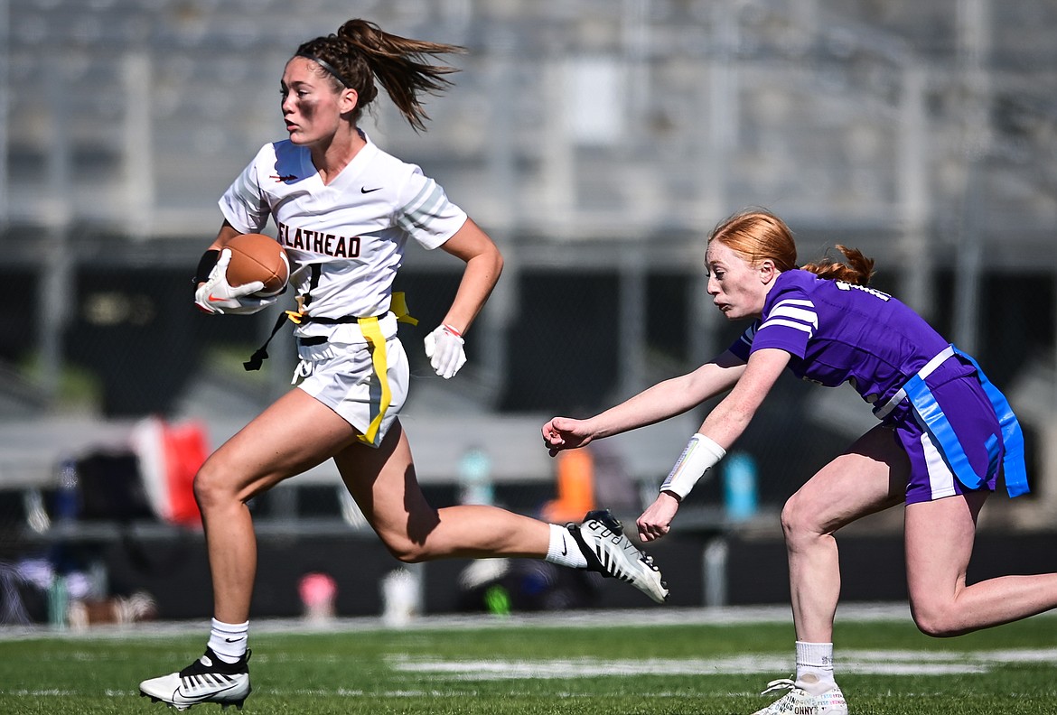 Flathead's Peyton Walker (1) breaks loose on a run against Butte at Legends Stadium on Saturday, Sept. 10. (Casey Kreider/Daily Inter Lake)