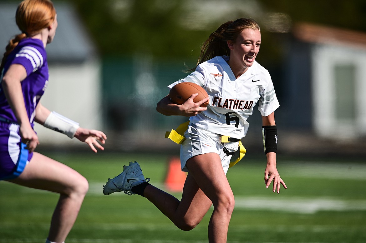 Flathead's Harlie Roth (6) returns an interception on defense against Butte at Legends Stadium on Saturday, Sept. 10. (Casey Kreider/Daily Inter Lake)