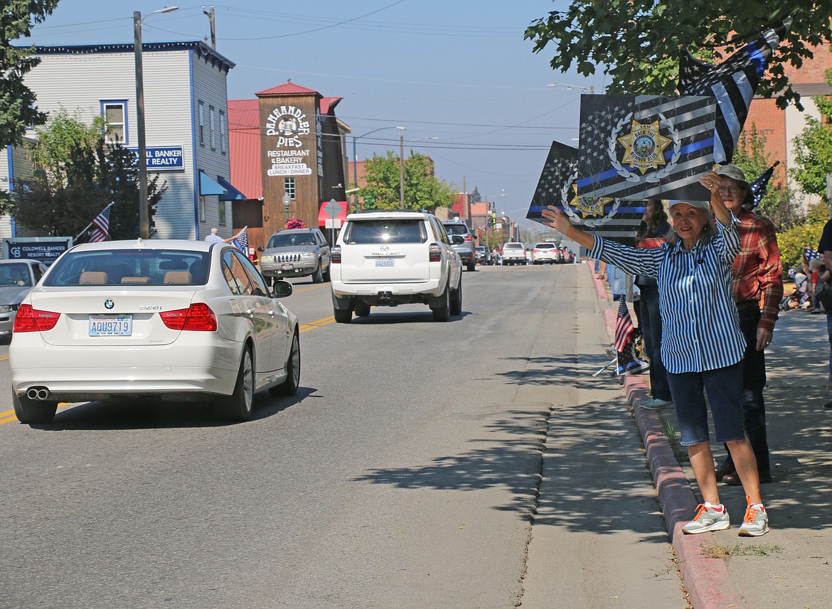 Area residents take part in Saturday's Back the Bonner Blue rally. The event, now in its third year, attracted about 75 to 90 people who turned out to show support for local law enforcement.