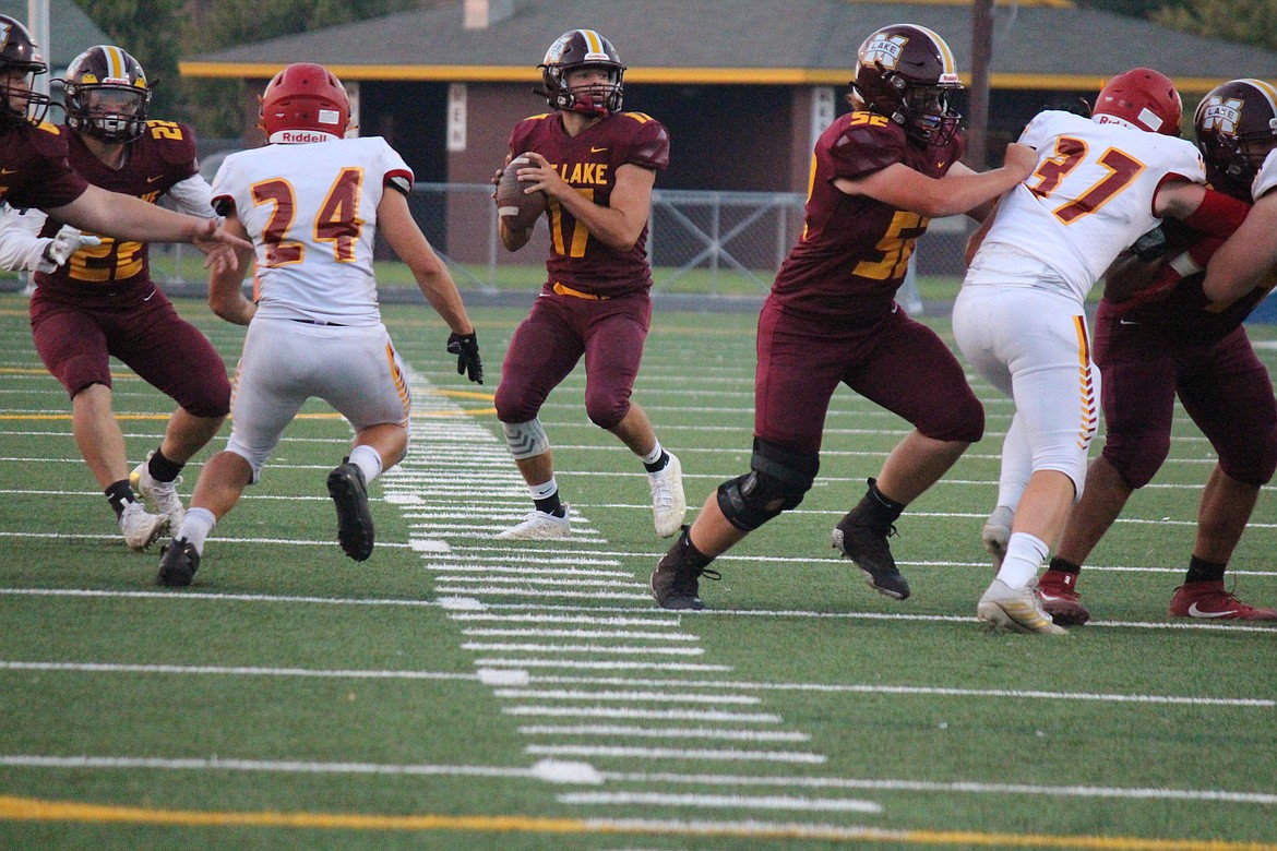 Brock Clark (17) Moses Lake quarterback, goes back to pass Friday night. The Mavericks lost 36-29 to Kamiakin.