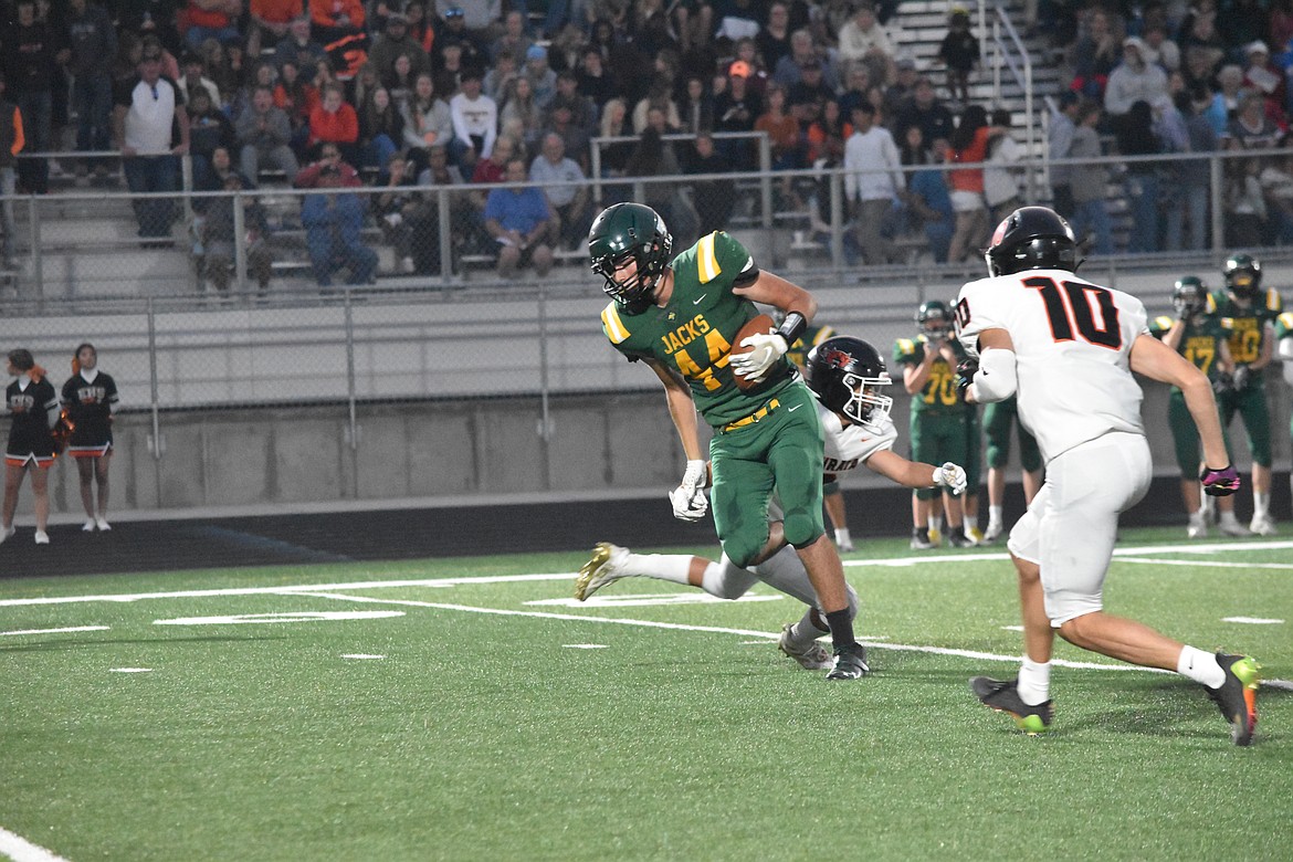 A Quincy player almost breaks through Ephrata’s defensive front.