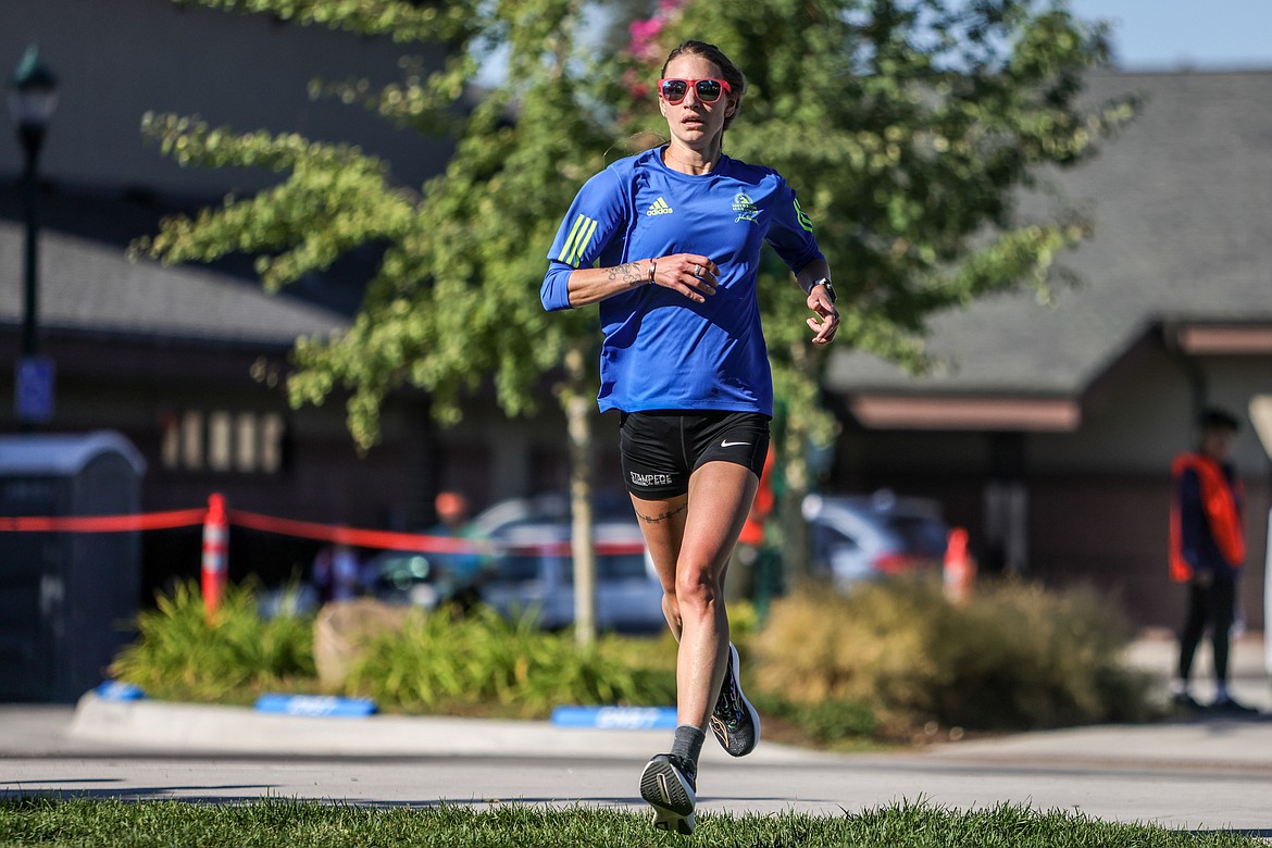 Kaitlyn McNamara finishes in the competitive race at the Great Fish Fun Run on Saturday at Depot Park. (JP Edge photo)