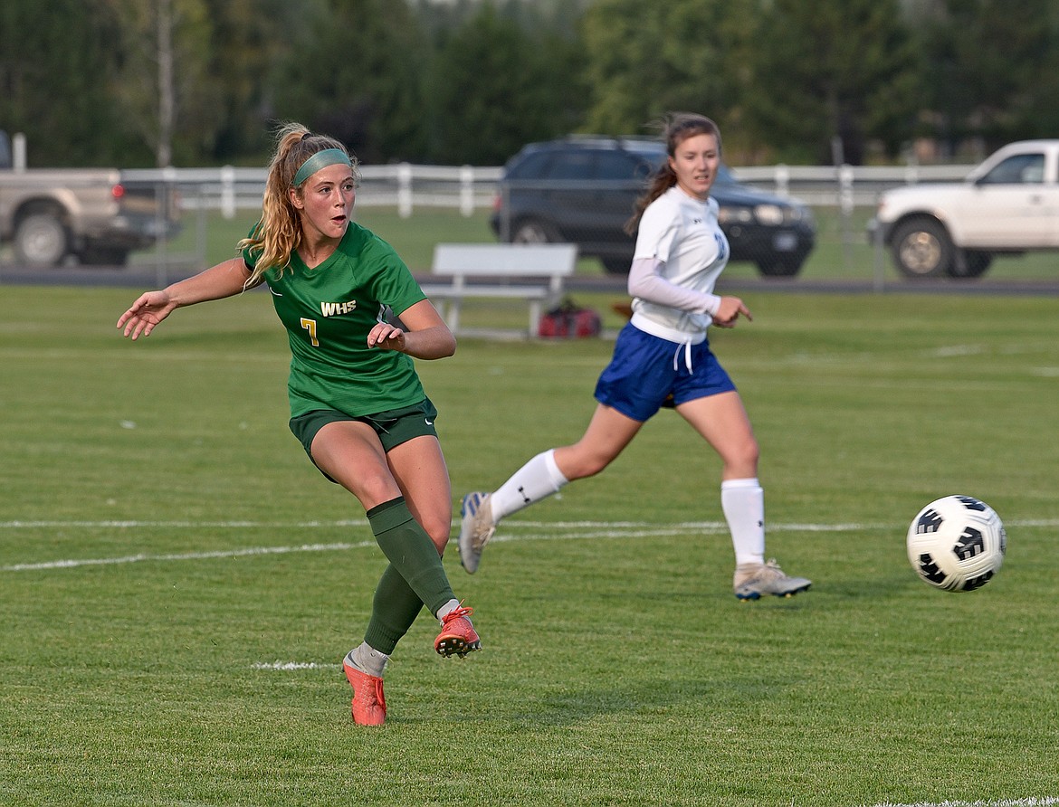 Whitefish's Brooke Roberts lines up a shot in a game against Libby at Smith Fields on Thursday. (Whitney England/Whitefish Pilot)