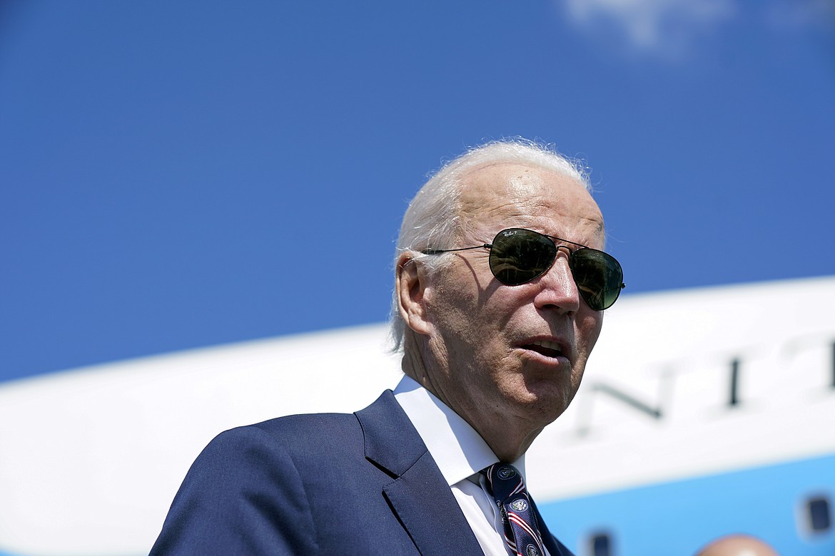 President Joe Biden speaks before boarding Air Force One at Columbus International Airport in Columbus, Ohio, Friday, Sep. 9, 2022, after attending a groundbreaking for a new Intel computer chip facility in New Albany, Ohio. (AP Photo/Manuel Balce Ceneta)