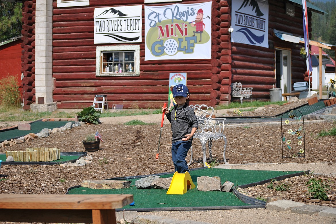 With fall rapidly approaching in western Montana, it's time for summer recreations to come to a close — like the first-of-its kind mini golf course in St. Regis. Becky Palmer owner of Two Rivers Thrift and St. Regis Mini Golf celebrated the mark of a successful summer season last Friday by allowing free putt putt games for all. (Mineral Independent/Amy Quinlivan)