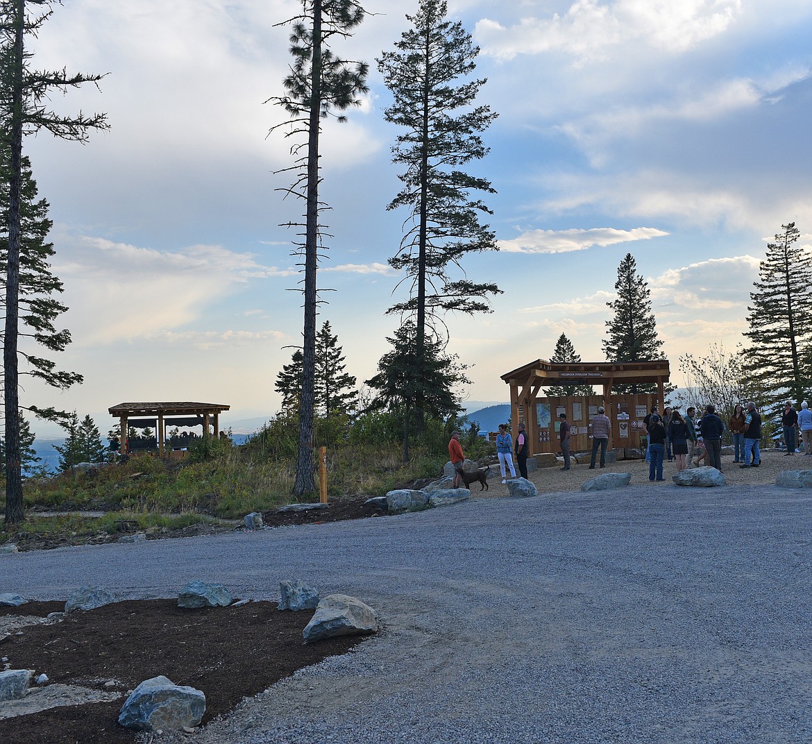 The kiosk and the covered bench area of the Holbrook Trailhead. (Julie Engler/Whitefish Pilot)