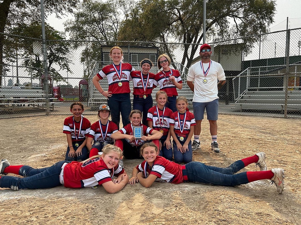 Courtesy photo
The 12U 2010 Lake City Thunder girls fastpitch softball team took first place at the Summer Sizzler tournament in Moses Lake on Sept. 11. In the front row from left are Brooklyn McPhedran and Ollie Dudley; second row from left, Ella Ferguson, Paisley Lund, Savannah Stevens, Prestyn Gardner and Shasta Ackerman; and back row from left, Reese Dutton, Rylin Olmstead, Raegen Masters and assistant coach Richmond Dudley. Not pictured are coaches Gene and Penny Ciraulo.