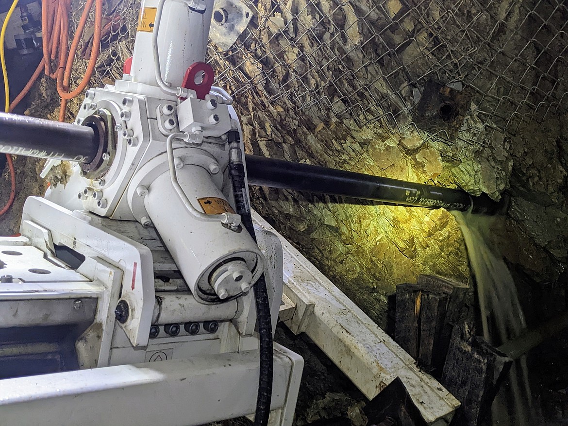 The LM110 drill in the Con-Sil Tunnel's Daylight Switch bores into a wall of the tunnel.