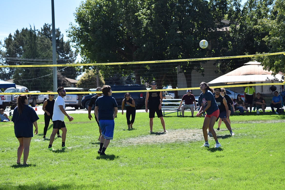 Volleyball teams face off in Volunteer Park at the beginning of the Warden Community Days volleyball tournament held on Monday, Sept. 5.