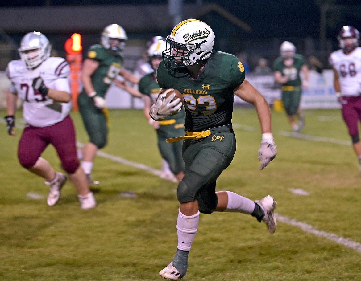 Whitefish's Ty Schwaiger returns a kick near the sideline during a game against Butte Central on Friday in Whitefish. (Whitney England/Whitefish Pilot)
