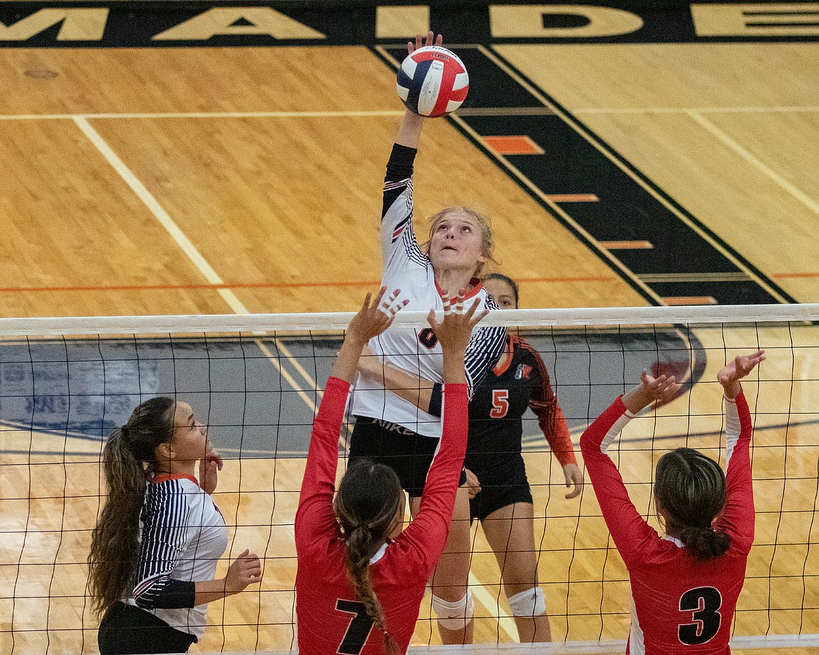 Ronan Maiden Lauryn Buhr swats the ball over the net during conference action against visiting Browning on Friday evening.
(Rob Zolman/Lake County Leader)