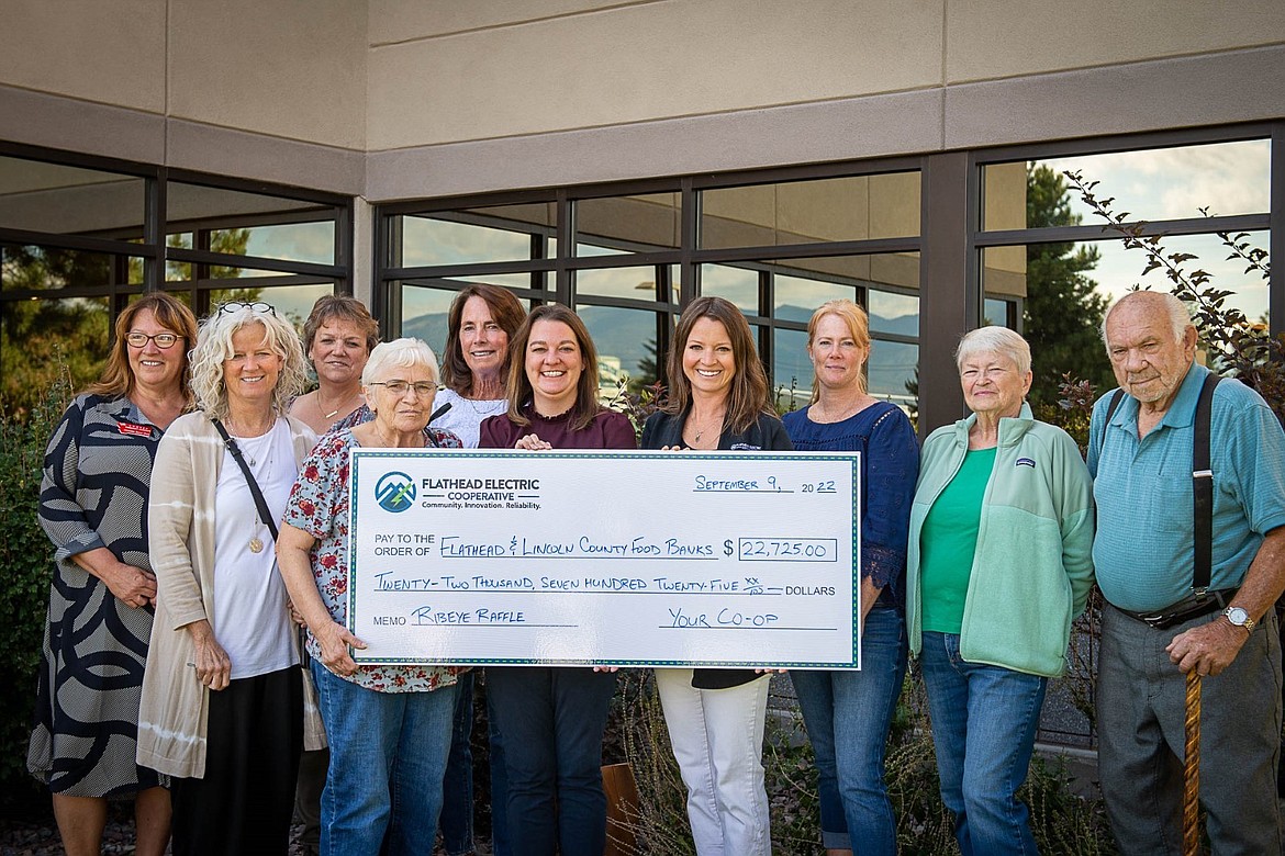 Representatives from local food banks gathered at Flathead Electric Co-op on Friday, Sept. 9, to celebrate $22,725 in cash and 1,000 pounds of meat raised by the Ribeye Raffle for the food banks. Left to right, Cinnamon Davis-Hall, Veterans; Elizabeth Temple, Northwest Valley; Tia Robbin, Co-op Assistant General Manager; Karen Casey, Libby; Julia Sunde, West Shore; Jamie Quinn, Flathead; Katie Pfennigs, Co-op Community Relations Manager; Ann Bohmer, Columbia Falls; Jan Vonlindern, Columbia Falls; Allen Erickson, Veterans. Not pictured: Bigfork Food Bank.