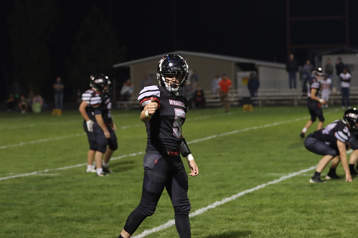 Receiver Grayson Beal gets set at the line during ACH’s 36-32 win over Entiat.