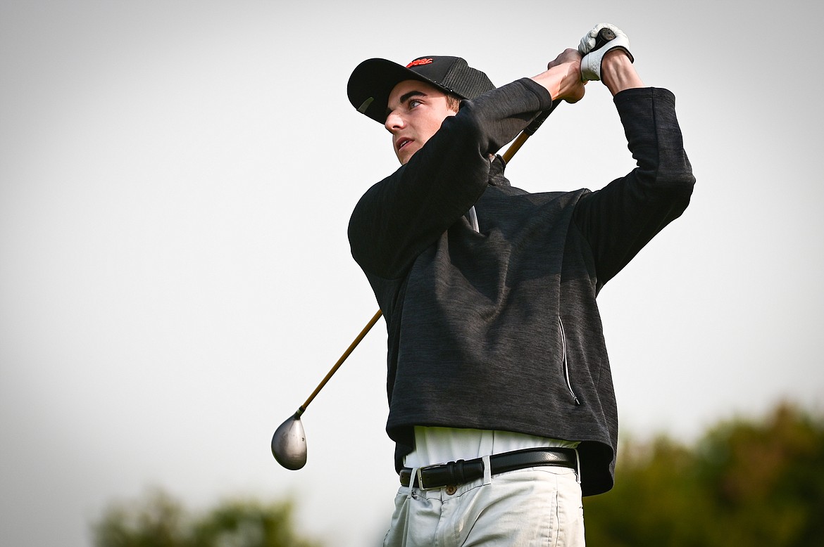 Flathead's Nick Dubois watches his drive on the 10th tee during the Kalispell Invite at Northern Pines Golf Club on Wednesday, Sept. 14. (Casey Kreider/Daily Inter Lake)