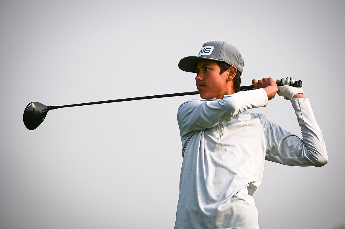 Glacier's Trevor Cunningham watches his drive on the 10th tee during the Kalispell Invite at Northern Pines Golf Club on Wednesday, Sept. 14. (Casey Kreider/Daily Inter Lake)