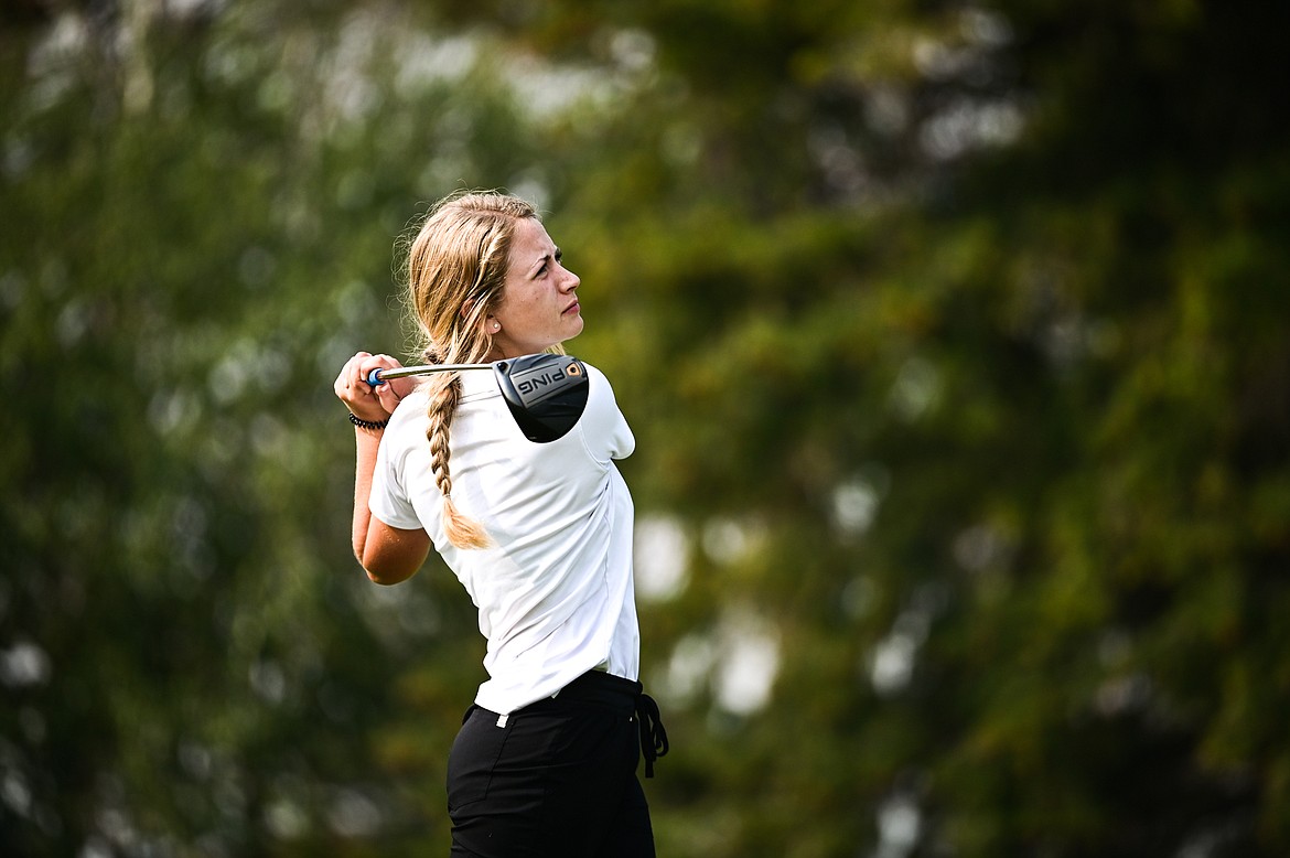 Flathead's McKinlie Murer watches her drive on the 8th tee during the Kalispell Invite at Northern Pines Golf Club on Wednesday, Sept. 14. (Casey Kreider/Daily Inter Lake)