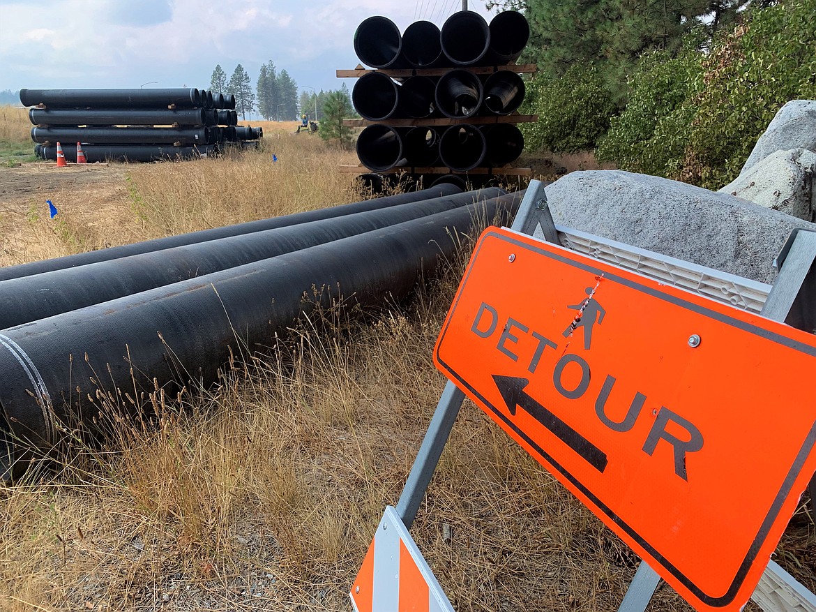 A detour signs greets westbound North Idaho Centennial Trail users near the Riverstone Transit Center.