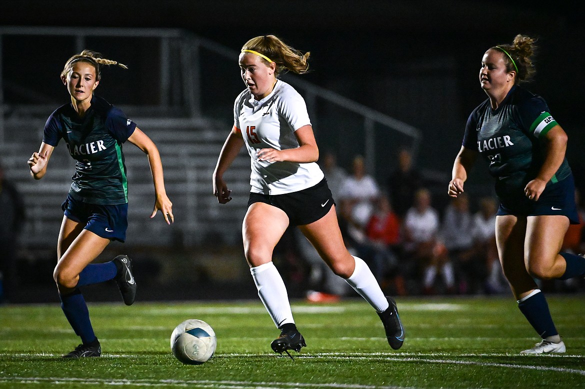 Flathead's Fiona Coulter (15) works the ball upfield against Glacier at Legends Stadium on Thursday, Sept. 15. (Casey Kreider/Daily Inter Lake)