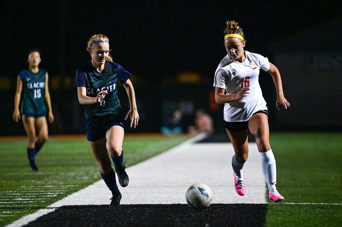 Flathead's Kyrie Gislason (16) pushes the ball upfield in the first half against Glacier at Legends Stadium on Thursday, Sept. 15. (Casey Kreider/Daily Inter Lake)