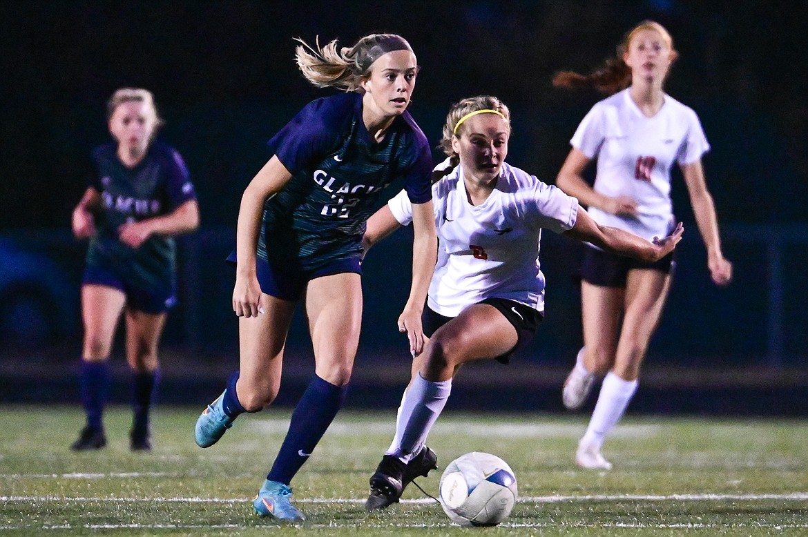 Glacier's Reagan Brisendine (22) pushes the ball upfield against Flathead at Legends Stadium on Thursday, Sept. 15. (Casey Kreider/Daily Inter Lake)