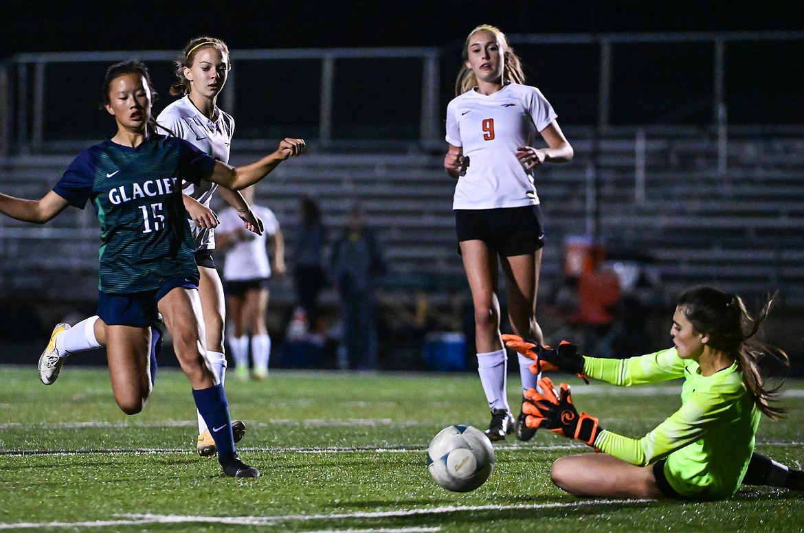 Flathead goalkeeper Joy Sund slides in for a save in the first half against Glacier at Legends Stadium on Thursday, Sept. 15. (Casey Kreider/Daily Inter Lake)